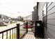 View from a townhome balcony, overlooking the street and other well-maintained residences at 135 Climbing Ivy Cir, Fayetteville, GA 30214