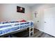 Bright bedroom features a low bed and is decorated with fun superhero themes at 135 Climbing Ivy Cir, Fayetteville, GA 30214