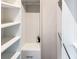 Well-organized closet features shelving, hanging rods, and drawer space at 135 Climbing Ivy Cir, Fayetteville, GA 30214