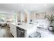 Beautiful kitchen featuring an island, stainless steel appliances, and an open floorplan at 135 Climbing Ivy Cir, Fayetteville, GA 30214