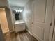 Bright bathroom featuring new fixtures, a modern vanity, and a tiled shower with sleek finishes at 1440 Kenilworth Sw Dr, Atlanta, GA 30310