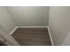 Walk-in Closet featuring new flooring and neutral paint at 1440 Kenilworth Sw Dr, Atlanta, GA 30310