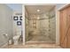 Charming bathroom with glass shower, toilet, and barn door at 1885 Dayron Trce, Marietta, GA 30062