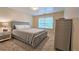Comfortable bedroom featuring a grey bed frame, neutral colors, and natural light at 1885 Dayron Trce, Marietta, GA 30062