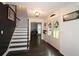 Elegant foyer with hardwood floors, staircase, and a view into the dining room at 1885 Dayron Trce, Marietta, GA 30062