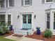 Close up on a charming blue front door with a 