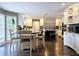 Eat-in kitchen featuring modern appliances, center island and ample cabinet space at 1885 Dayron Trce, Marietta, GA 30062
