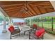 Pool pavilion featuring lounge seating under a covered, wooden ceiling at 1885 Dayron Trce, Marietta, GA 30062