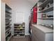 Well-organized walk-in closet with shelves for shoes, clothes, and accessories, maximizing storage space at 1885 Dayron Trce, Marietta, GA 30062