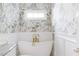 Elegant bathroom showcasing a white standalone tub, tasteful decor and natural light at 220 Foxley Way, Roswell, GA 30075