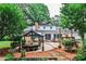Backyard patio with dining area and lush greenery at 2244 Deer Ridge Dr, Tucker, GA 30087