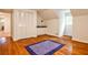 Bedroom with hardwood floors, closet, and neutral paint at 2244 Deer Ridge Dr, Tucker, GA 30087
