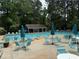 A community pool with ample seating for relaxing and socializing under the sun at 2244 Deer Ridge Dr, Tucker, GA 30087