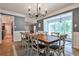 Elegant dining room with stylish chandelier, hardwood floors, and an inviting space for gatherings at 2244 Deer Ridge Dr, Tucker, GA 30087