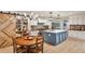 Open concept kitchen with center island, stainless steel appliances, and access to the dining area at 2244 Deer Ridge Dr, Tucker, GA 30087