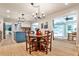 Charming eat-in kitchen showcases a central island, natural light, and a seamless flow into a cozy sunroom at 2244 Deer Ridge Dr, Tucker, GA 30087