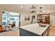Bright kitchen with island, open layout to living area, and great natural light at 2244 Deer Ridge Dr, Tucker, GA 30087