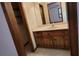 Vanity in the bathroom with tiled floors, wooden cabinets, white countertop and sink at 294 A Donald Rd, Canton, GA 30114