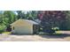 Charming one-story home with attached two car garage, green lawn, and paved driveway at 294 A Donald Rd, Canton, GA 30114