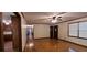 Spacious living room features hardwood floors, ceiling fan, and natural light from the windows at 294 A Donald Rd, Canton, GA 30114