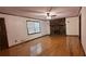 Open living room boasts hardwood floors, fireplace, and ample natural light at 294 A Donald Rd, Canton, GA 30114