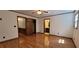 Bright main bedroom features hardwood floors, ceiling fan and ensuite bathroom access at 294 A Donald Rd, Canton, GA 30114