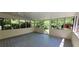 Enclosed porch with wood flooring and many windows at 294 A Donald Rd, Canton, GA 30114