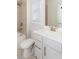 Bright bathroom featuring a shower-tub combo, undermount sink, and white vanity at 5015 Montes Ln, Cumming, GA 30040