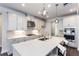 Gourmet kitchen featuring granite countertops, stainless steel appliances, and pendant lighting at 5015 Montes Ln, Cumming, GA 30040