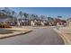 Street in a residential neighborhood featuring well-maintained homes and landscaping at 5015 Montes Ln, Cumming, GA 30040