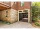 Unique basement garage with glass door and stone exterior at 588 Oakdale Ne Rd, Atlanta, GA 30307