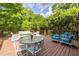 Expansive wooden deck with outdoor seating, perfect for entertaining and relaxation at 588 Oakdale Ne Rd, Atlanta, GA 30307