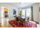 Dining room with hardwood floors and views of the living room and stainless steel appliances in the kitchen at 588 Oakdale Ne Rd, Atlanta, GA 30307