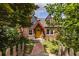 Charming brick home with a bright yellow front door and well-manicured landscaping at 588 Oakdale Ne Rd, Atlanta, GA 30307
