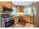 Updated kitchen featuring granite countertops and stainless steel appliances at 588 Oakdale Ne Rd, Atlanta, GA 30307
