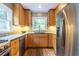 Updated kitchen featuring granite countertops, stainless steel appliances, and wood cabinets at 588 Oakdale Ne Rd, Atlanta, GA 30307