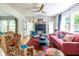 Cozy living room features hardwood floors, fireplace, and an abundance of natural light at 588 Oakdale Ne Rd, Atlanta, GA 30307