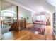 Open living room with high ceilings, hardwood floors, decorative rug and loft bedroom at 588 Oakdale Ne Rd, Atlanta, GA 30307