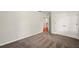 This bedroom includes soft carpeting and double doors to a closet at 1256 Spring Park Sw Dr, Atlanta, GA 30311