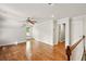 Large bedroom with hardwood floors, a ceiling fan, and great natural light from a window at 1256 Spring Park Sw Dr, Atlanta, GA 30311