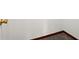 This home features a narrow hallway with neutral walls and wood flooring at 1256 Spring Park Sw Dr, Atlanta, GA 30311