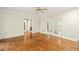 Spacious living room features hardwood floors, fireplace and recessed lighting creating a warm ambiance at 1256 Spring Park Sw Dr, Atlanta, GA 30311