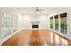 Bright living room with hardwood floors, fireplace and large windows offering great natural light at 1256 Spring Park Sw Dr, Atlanta, GA 30311