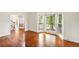 Spacious living room with hardwood floors, large windows, and an open layout perfect for entertaining at 1256 Spring Park Sw Dr, Atlanta, GA 30311