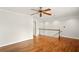 This home has a hardwood loft with high ceilings, a ceiling fan, and access to bedrooms at 1256 Spring Park Sw Dr, Atlanta, GA 30311
