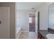Full bathroom with granite countertop vanity and tub with shower at 1436 Arbor Place Dr, Morrow, GA 30260