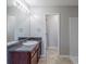 Full bathroom featuring a single vanity and shower-tub combo at 1436 Arbor Place Dr, Morrow, GA 30260