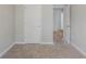 Spacious bedroom showing carpeted floor and interior doors at 1436 Arbor Place Dr, Morrow, GA 30260