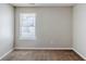 Bedroom featuring plush carpet, neutral paint, and a sunny window at 1436 Arbor Place Dr, Morrow, GA 30260