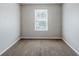 A simple bedroom featuring neutral walls and carpet at 1436 Arbor Place Dr, Morrow, GA 30260